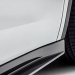 A close up view of Vorsteiner VRS Aero Side Skirts Carbon Fiber PP 2x2 Glossy (for Model Y).