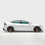 wide side view of TRE Vorsteiner Style Carbon Fibre VOLTA Aero Side Skirt For Tesla Model 3 2018+ fitted inside a car