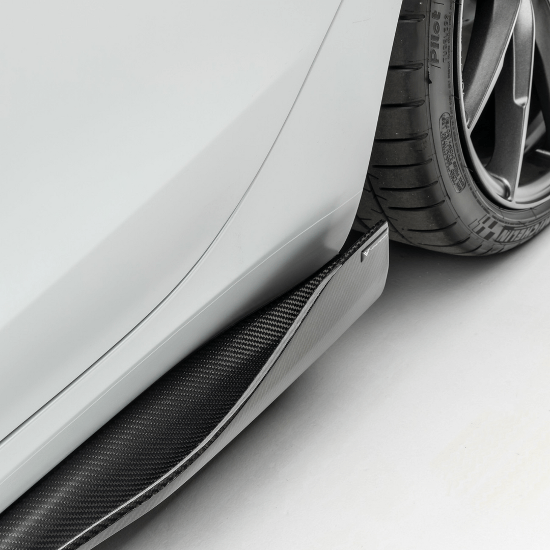 close front side view of TRE Vorsteiner Style Carbon Fibre VOLTA Aero Side Skirt For Tesla Model 3 2018+ fitted inside a car