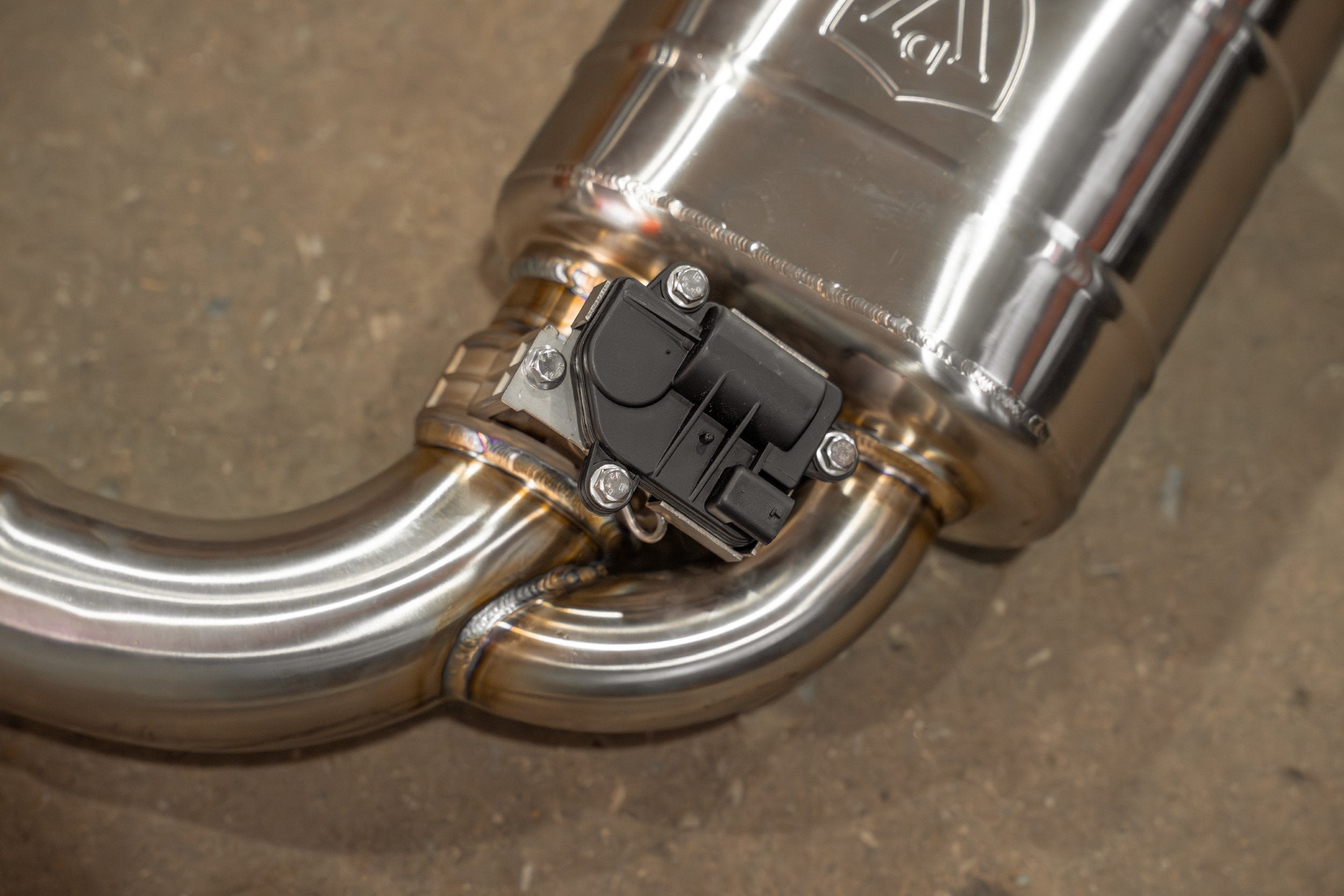Valvetronic Designs Valved Exhaust VW Golf GTI MK7 manufacturer gallery: electronic valve actuator beneath the rear muffler