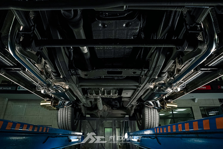 A view of FI Exhaust Valvetronic Cat-Back System For Mercedes-Benz W463 G550 / 4x4 Ultimate Double Quad tips 2015-2017 fitted on a lifted car from underneath