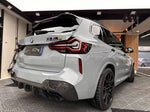 wide view of TRE Pre-Preg Carbon Fibre Rear Diffuser for BMW X3M LCI F97 2022+ fitted inside a car