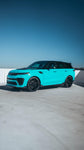 Teal Urban Widetrack Range Rover Sport L461 on a rooftop