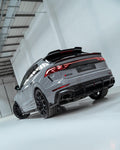 Rear three-quarter view of the Urban carbon diffuser and spoilers on an Audi RS Q8 facelift