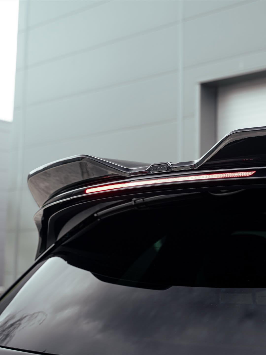 Close-up of the Urban gloss black upper rear spoiler on a Range Rover Sport L461