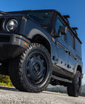 Urban WX4 satin black wheels on an INEOS Grenadier, front three-quarter close-up (other accessories shown are not included)