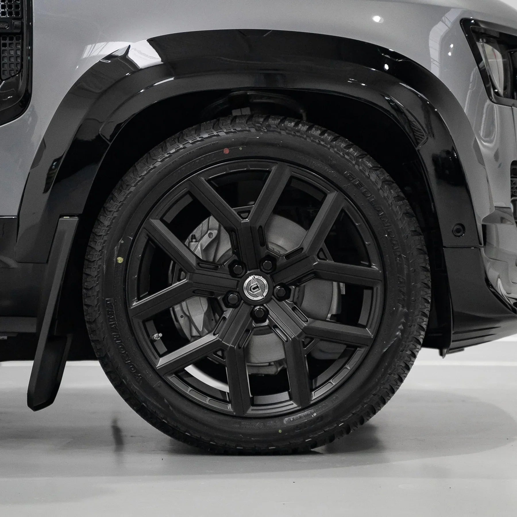 Close-up of an Urban Widetrack front fender arch on a Land Rover Defender