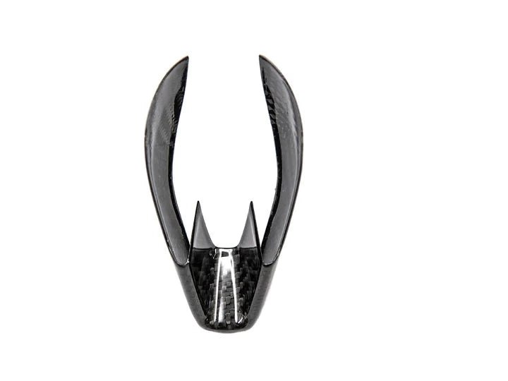 A front view of AUTOTECKNIC DRY CARBON GEAR SELECTOR COVER for BMW Models with white background