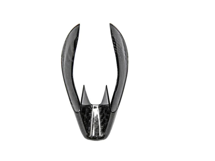 A front view of AUTOTECKNIC DRY CARBON GEAR SELECTOR COVER for BMW Models with white background
