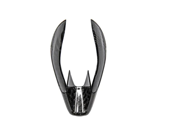 A front view of AUTOTECKNIC DRY CARBON GEAR SELECTOR COVER for BMW Models with white background