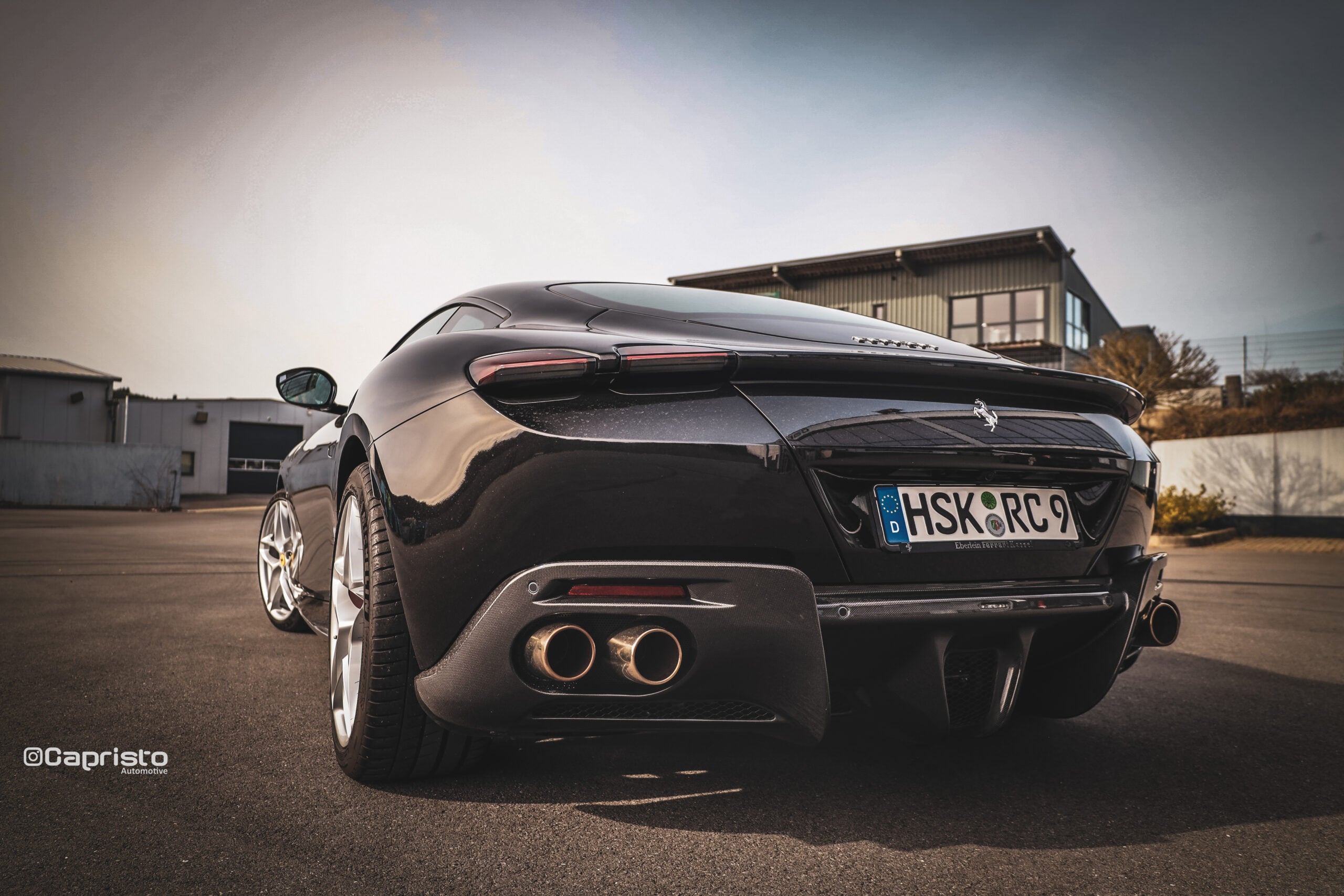Black Ferrari Roma rear with Capristo carbon diffuser