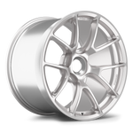 Silver forged aluminum wheel with ten-spoke design, polished finish, center bore and bolt pattern visible - APEX Wheels wheel for 19x12 ET46 PSCL - Race Silver