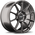 Gunmetal finished alloy wheel with ten-spoke design shown at angle displaying face and barrel - APEX Wheels wheel for 18x9 ET46 5x130 - Anthracite