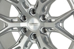 A close up view of Vossen HF6-4 Wheel 20x9.5 6X135 15mm - Silver Metallic Wheel with white background