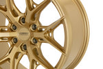 A close up view of Vossen HF6-4 20x9.5 / 6x135 / ET15 / 87.1 - Satin Gold Wheel with white background