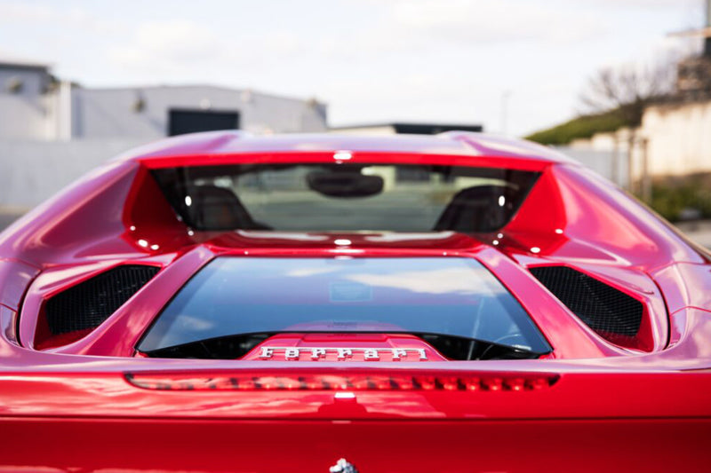 Red Ferrari 488 Spider rear with Capristo carbon and glass Design S bonnet