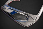 Close-up of carbon weave and mesh vent on Capristo 488 Spider Design S bonnet