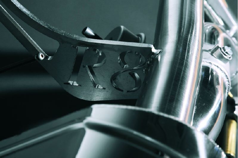 Close-up of R8 logo bracket on Capristo Audi R8 V8 exhaust