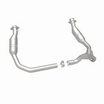 MagnaFlow 5551291 carb direct-fit catalytic converter, rear three-quarter view of the turntable spin