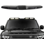 A front close up view of Urban Automotive XRS Limited Edition Carbon Quad-Pod Lazer Lightbar for Land Rover L663 Land Rover Defender 90 / 110 / 130 2020-2025 white white background