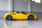 Yellow Ferrari 488 Spider profile with Capristo carbon side fins