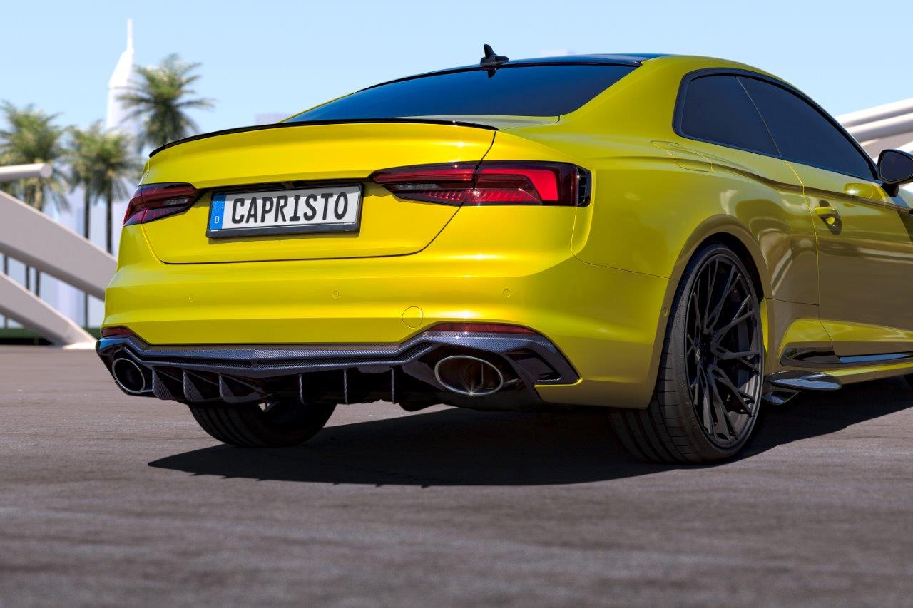 Yellow Audi RS5 F5 coupe rear three-quarter with Capristo exhaust and oval RS tips