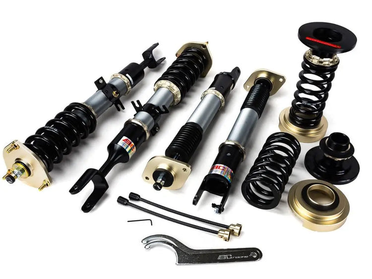 A front view of BC Racing DS Series Coilovers (JZX90/JZX100) for Toyota Chaser Avante / Tourer 1992-2000 with white background