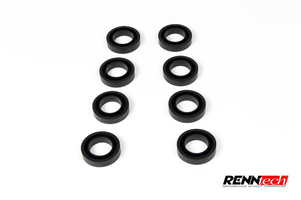 Spark plug tube seals laid out - Top End Gasket Kit for the AMG M117 4-valve models