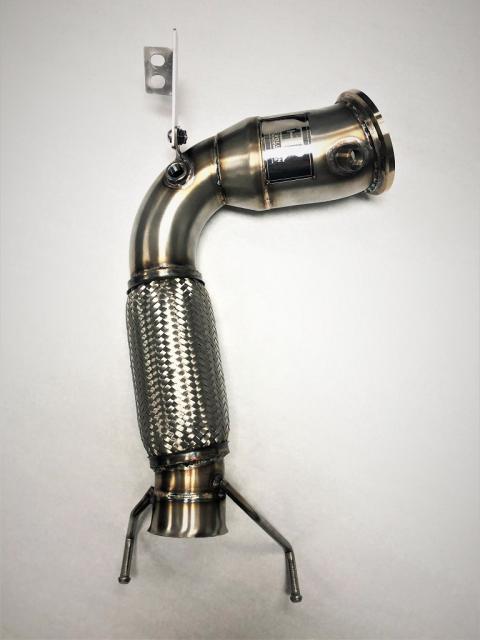 A top view of Evolution Racewerks Competition Series 4" Downpipe for BMW X1/X2/2 Series Gran Coupe/Mini with B46/B48 Engine in Brushed Finish