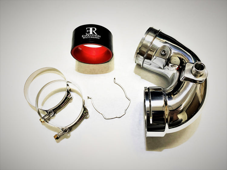 A top view of Evolution Racewerks BMW S55 (3.0TT) F80/F82/F83/F87 Cold Side "J" Charge Pipe in Polish Finish