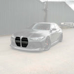 wide view of TRE Carbon Fibre GT Front Kidney Grilles by TRE for BMW G8X M3 / M4 2020+ fitted inside a car