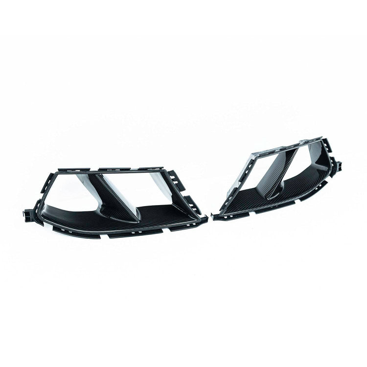 wide view of TRE Pre-Preg Carbon Fibre Performance Style Front Ducts for BMW M3 G80 / G81 & M4 G82 / G83 2021+ of white background