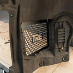 wide side view of TRE Metal Skid Plate & Arch Clearance Kit PacK for BMW M2/M3/M4 2020+ fitted inside a car