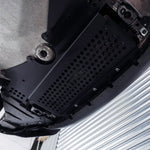 close view of TRE Metal Skid Plate & Arch Clearance Kit PacK for BMW M2/M3/M4 2020+ fitted inside a car