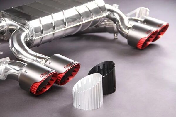 Wide view of Capristo Valved Exhaust, MidSilencer Delete, 200 Cell OPF/GPF Replacement, & Wicrom Tips (OE Actuators) for BMW M3/M4 G8X 2021-2024 with black background