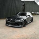 Far wide front view of TRE PR-1 Pre-Preg Carbon Fibre Body Kit for BMW M3 G80 2020+ fitted inside a car