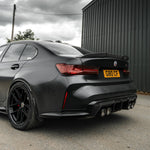 Wide side view of TRE PR-1 Pre-Preg Carbon Fibre Body Kit for BMW M3 G80 2020+ fitted inside a car