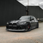 Wide front view of TRE PR-1 Pre-Preg Carbon Fibre Body Kit for BMW M3 G80 2020+ fitted inside a car