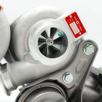 A close up view of Pure Turbos Turbo Upgrade Pure600 for BMW N54 2006-2016 with white background