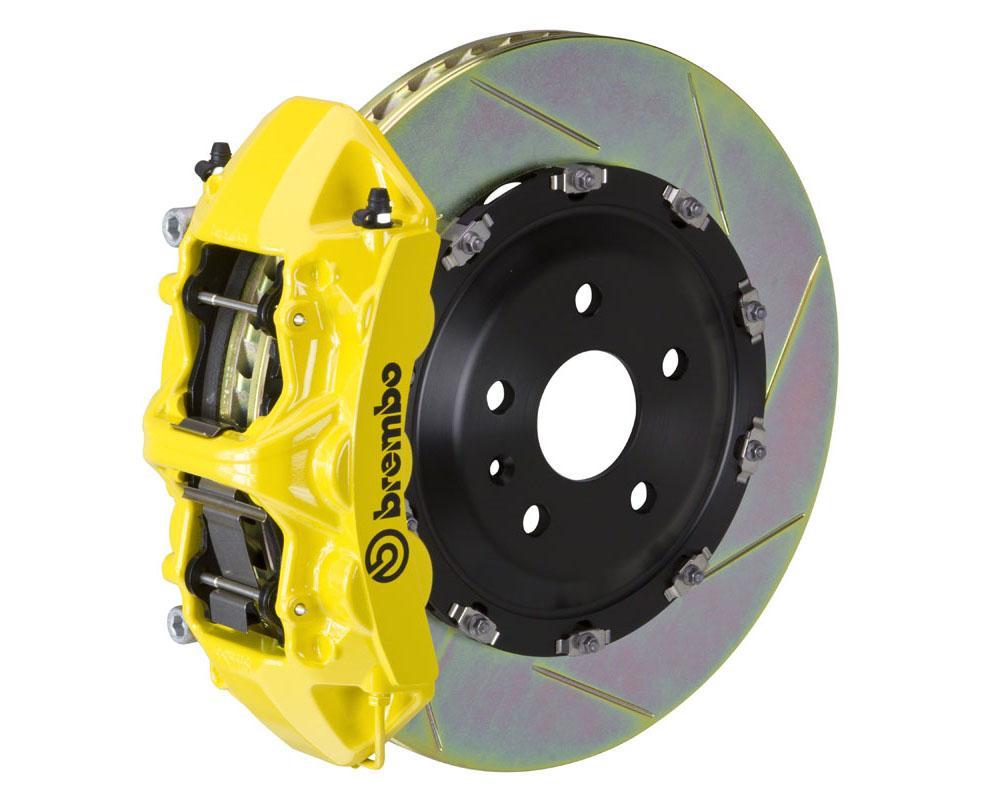 A front view of Brembo GT Front Big Brake Kit 380x34 6-Piston Slotted Rotors for Volkswagen Tiguan R (Mk2) in yellow caliper with white background
