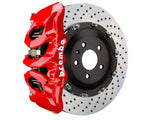 A front view of Brembo GT Front Big Brake Kit 380x34 6-Piston Drilled Rotors for Volkswagen Tiguan R (Mk2) in red caliper with white background