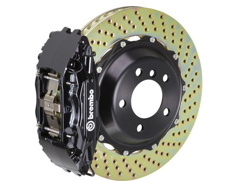 A front view of Brembo GT Front Big Brake Kit 355x32 2-Piece 4-Piston Drilled Rotors for Porsche 993 C2 / C4 in Black caliper with white background