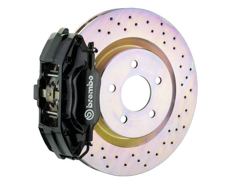 A front view of Brembo GT Front Big Brake Kit 330x28 1-Piece 4-Piston Drilled Rotors for Ford Mustang (SN95) 1994-2004 with white background