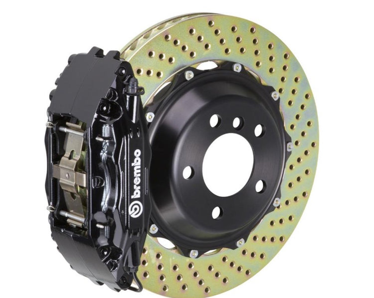 A front view of Brembo GT Front Big Brake Kit 332x32 2-Piece 4-Piston Drilled Rotors for Porsche 993 C2 / C4 in Black with white background