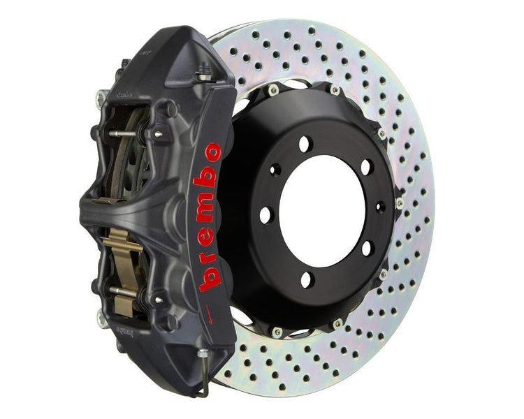 A front view of Brembo GT-S Front Big Brake Kit 355x32 2-Piece 6-Piston Drilled Rotors for Porsche 993 C2 / C4 with white background