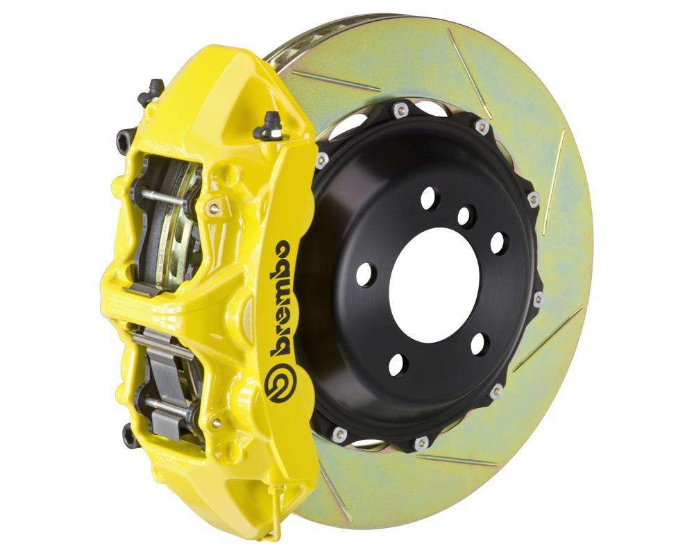 A front view of Brembo GT Front Big Brake Kit 380x32 2-Piece 6-Piston Slotted Rotors for Porsche 993 C2 / C4 in yellow caliper with white background