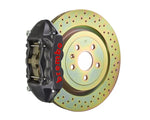 A front view of Brembo GT-S Front Big Brake Kit 323x28 1-Piece 4-Piston Drilled Rotors for Porsche 911S / SC / Carrera 1966-1989 with hard anodized caliper