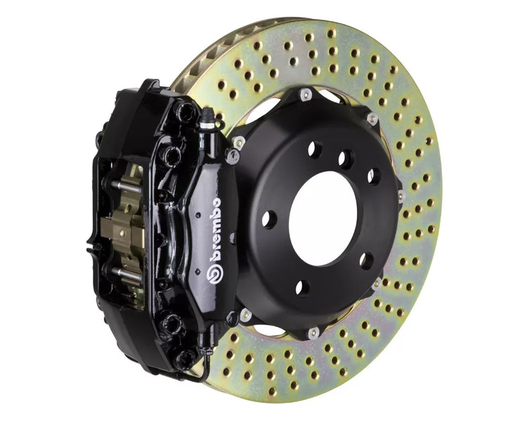A front view of Brembo GT Front Big Brake Kit 355x32 2-Piece 4-Piston Drilled Rotors for Porsche 964 Carrera 2 / 4 1989-1994 with black caliper