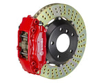 A front view of Brembo GT Front Big Brake Kit 355x32 2-Piece 4-Piston Drilled Rotors for Porsche 964 Carrera 2 / 4 1989-1994 with red caliper