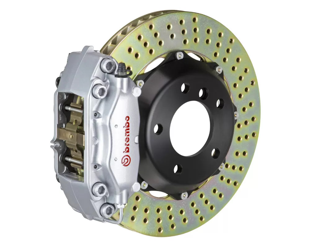 A front view of Brembo GT Front Big Brake Kit 355x32 2-Piece 4-Piston Drilled Rotors for Porsche 964 Carrera 2 / 4 1989-1994 with silver caliper